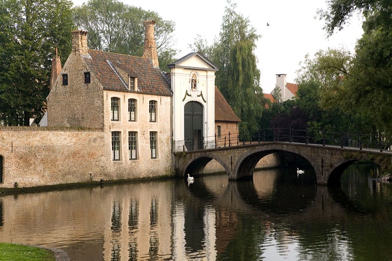 Begijnhof Brugge: A gated community of single lay women within Medieval city centers with a democratic, rotating structure of inner governance. Béguinages allowed women to live a life independent of men, and even engage in certain productive activities. Even though they did not take religious vows, beguines retained their social standing in society for centuries by looking after the sick and the destitute.