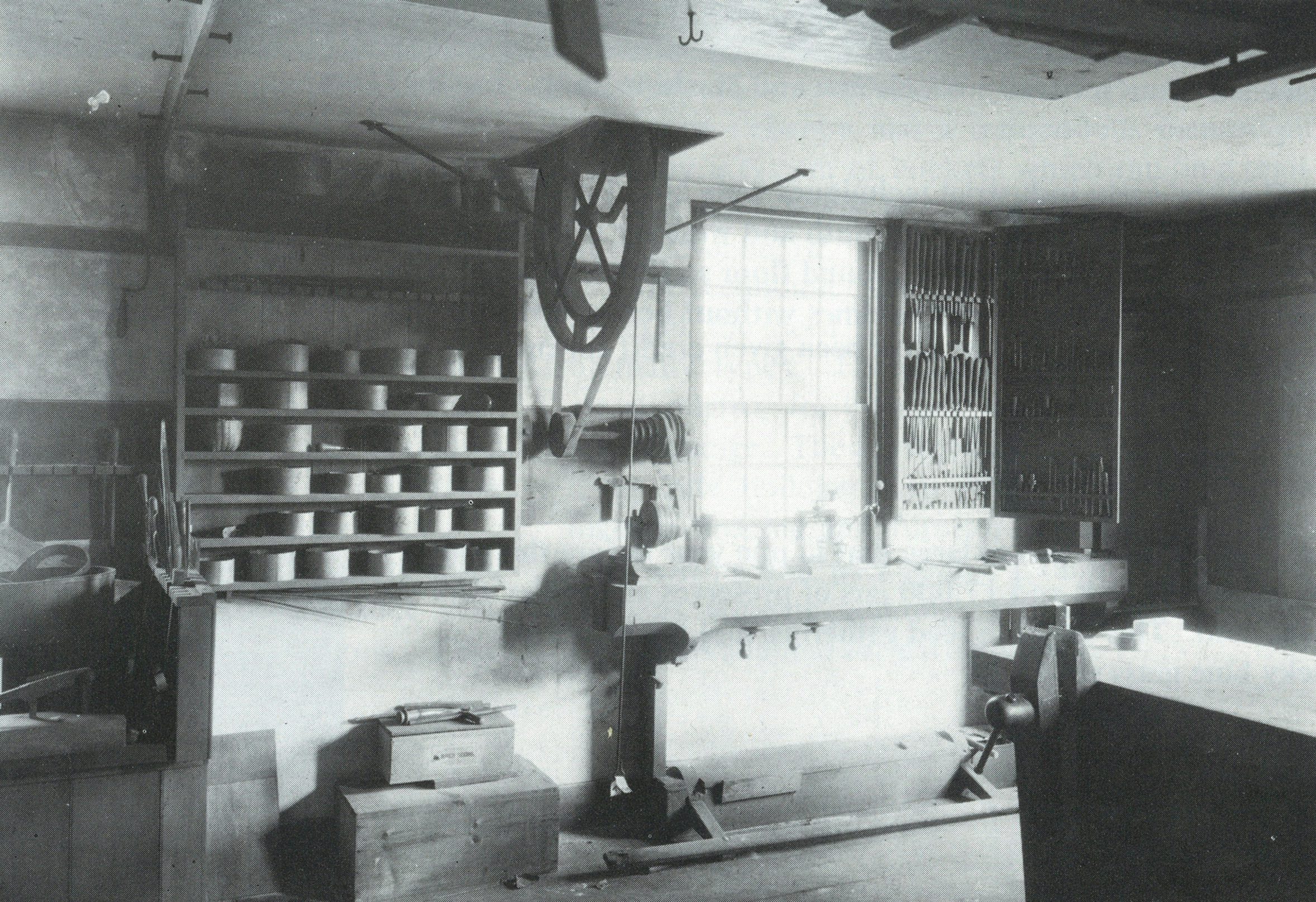 Brethren’s workshop at Mount Lebanon, where Brothers Amos Biscy and Henry Bennett invented the tongue and groove machine in 1828. Shakers worked in silence, constantly learning new trades and encouraged to find ways of doing tasks that would decrease human toil so more time could be dedicated to dance and prayer.