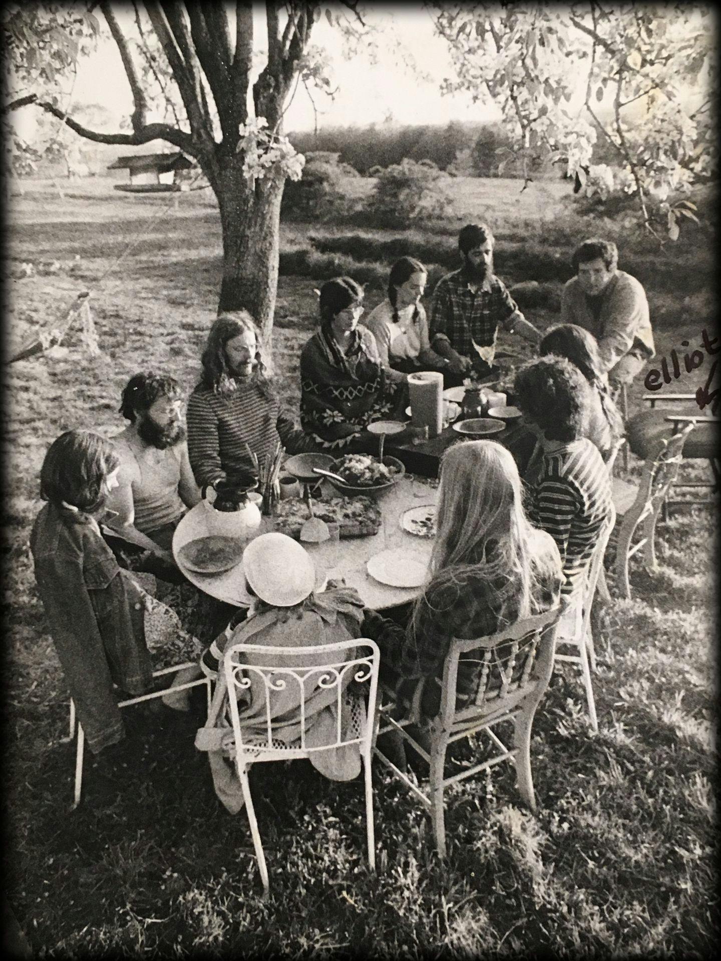 Members of the commune at Tree Frog Farm in Vermont saying grace before a meal